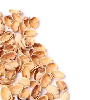 hull pistachios are located left on a white background