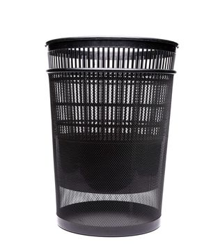 Plastic into metal trash cans on white background