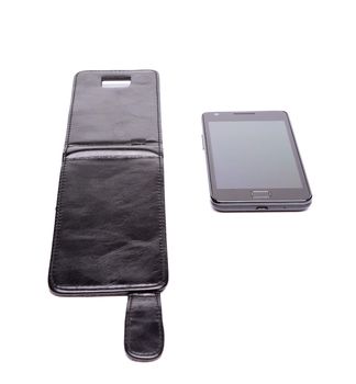 Mobile phone and leather case over white background