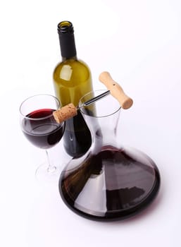 decanter, bottle and glass with red wine top view