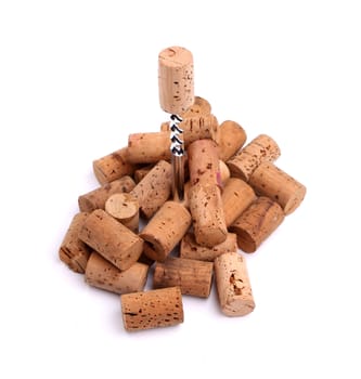 Corkscrew and wine corks close-up on the white background