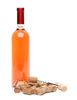 A bottle of wine, corks and corkscrew isolated on the white background.