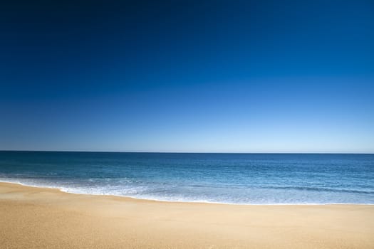 Beautiful landscape of a white sand beach from south europe