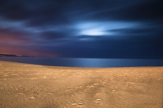 Beautiful night landscape of a white sand beach from south europe