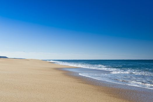 Beautiful landscape of a white sand beach from south europe