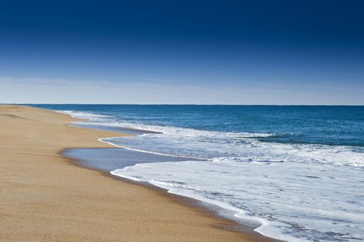 Beautiful landscape of a white sand beach from south europe