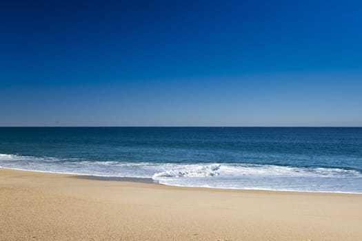 Beautiful landscape of a white sand beach from south europe