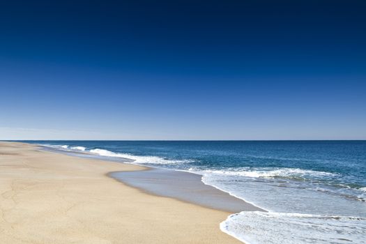 Beautiful landscape of a white sand beach from south europe