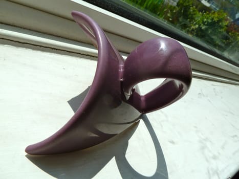 cup handle in bright sunlight