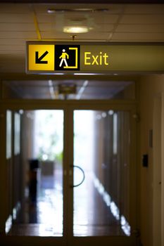 Exit sign in a corridor