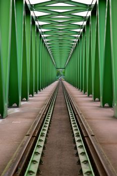 Railway bridge with steel grid structure