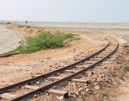 Old railway line on Sambhar Salt Lake. It is the India's largest saline lake, where salt has been farmed for a thousand years. 