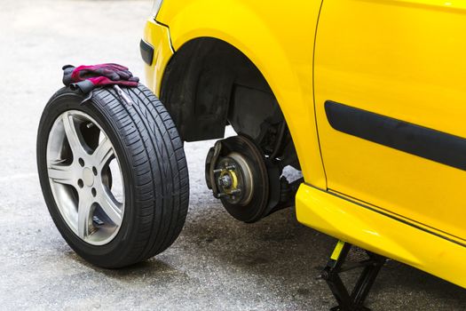 Close up of a breakdown car in the process of repairing. 