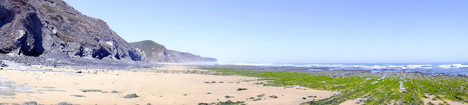 Rocks and ocean at Vale Figueiras in Portugal