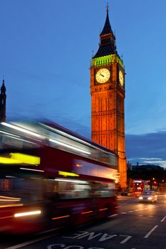 London cityscape with Elizabeth Tower and moving Double Decker buses