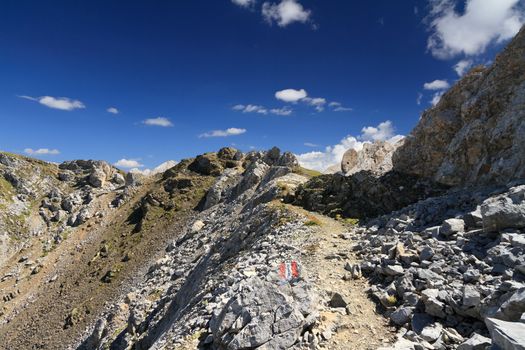 footpath on mountain ridge in San Pellegrino valley, Trentino, Italy