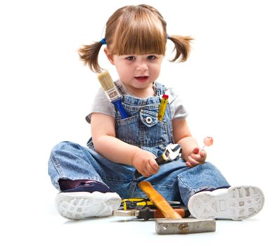 baby girl with working tool