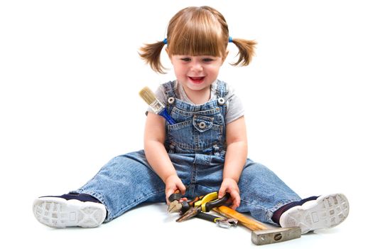 baby girl with working tool