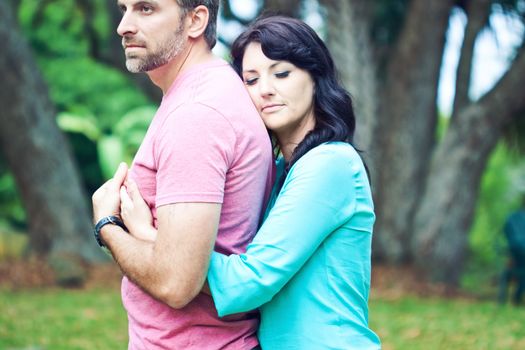 Portraite of a happy couple outdoors in the park 