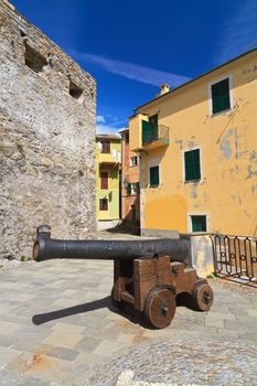 small square with an ancient cannon in Camogli, Italy