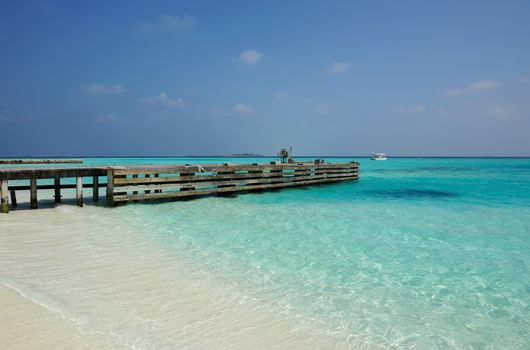 Beautiful beach with jetty at Maldives