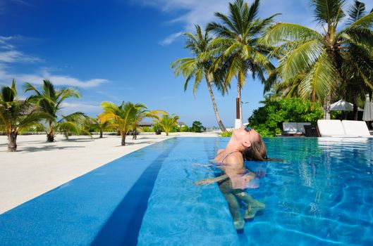 Woman at the swimming pool 