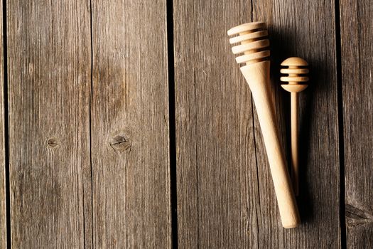 Two wooden dippers on table