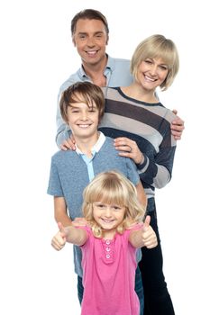 Portrait of caucasian family of four isolated over white