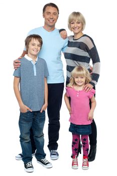 Portrait of happy family of four on white background