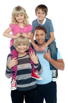 Portrait of a cheerful family over white background