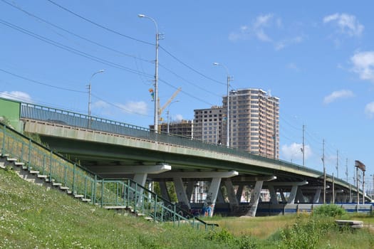 The bridge through the railroad on Melnikayte St., Tyumen