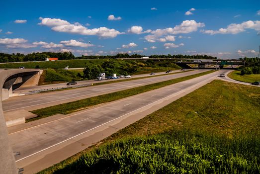 clover leaf exit ramps on highway near city