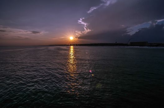 sunset at gulf of mexico from okaloosa island pier