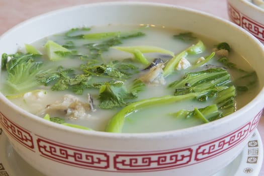 Fish Head Soup with Chinese Vegetable Parsley Tofu and Cilantro Closeup