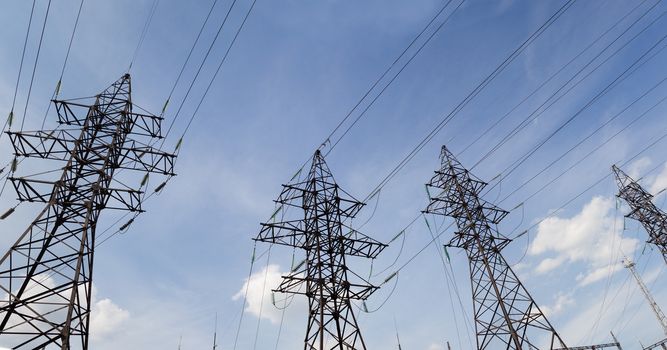 Transmission line on a background of the blue sky