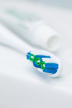 Closeup image of professional toothbrush and toothpaste in tube