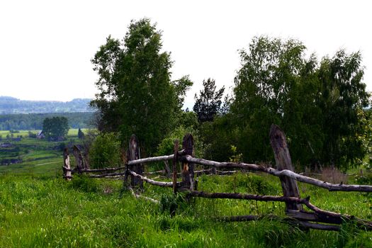 old wooden fence in the village side