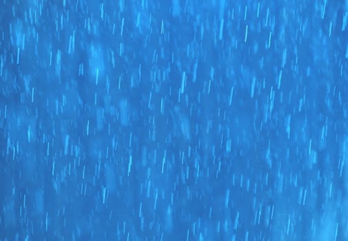 Abstract textured white bar rain on a blue background