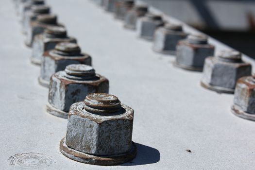 Weathered bolts on a steel beam, part of a bridge in Welland, Ontario, Canada