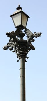 Gargoyles decorating a lamp post in Mazatlan, Mexico