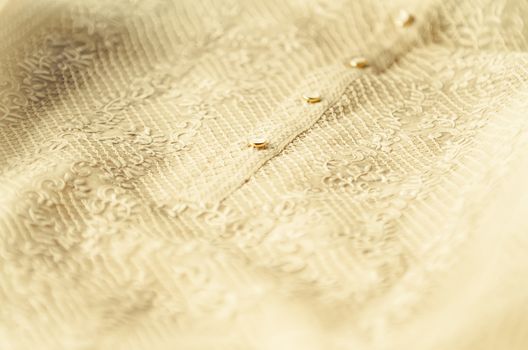 Closeup of groom's Barong Tagalog during a Philippine wedding 