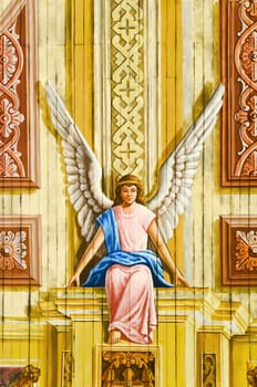 A 400-year old painting on a church ceiling depicting a guardian angel in Pampanga, Philippines.  The church is one of the country's national treasure.