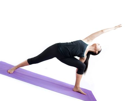 young brunette girl practising yoga isolated on white