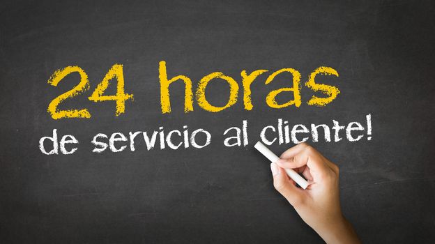 A person drawing and pointing at a 24 hour client Service Chalk Illustration