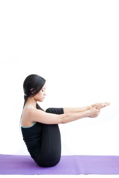 young brunette girl practising yoga isolated on white