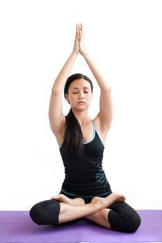 young brunette girl practising yoga isolated on white