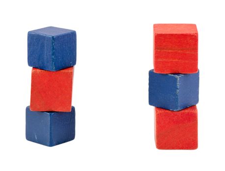 red blue color wooden toy log blocks bricks stand isolated on white.