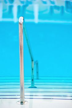 descent into the pool and railings