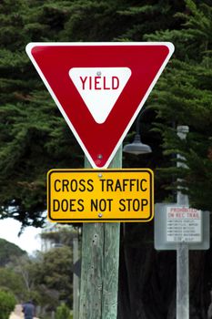 Yield Sign Cross Traffic Does Not Stop Road Sign