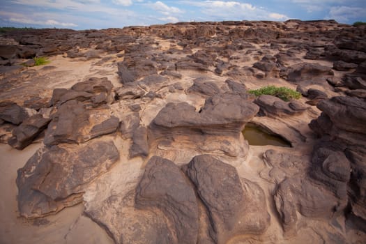 Sampanbok (3000 Hole), The Amazing of Rock in Mekong River, Ubon Ratchathani, Thailand.